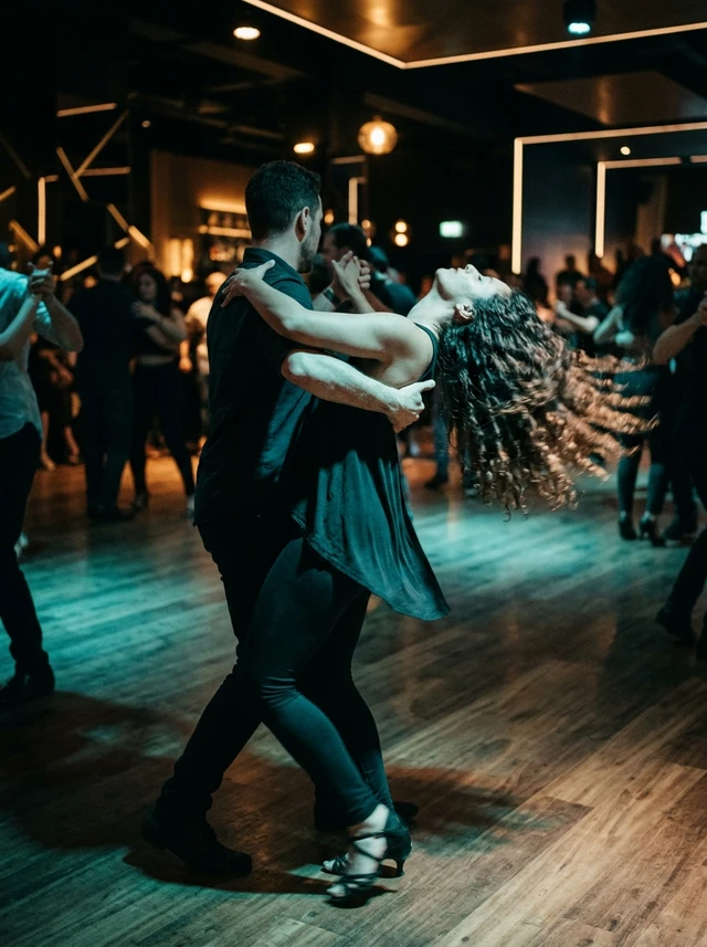 Zouk social dancing — couple dancing Zouk at a social dance event