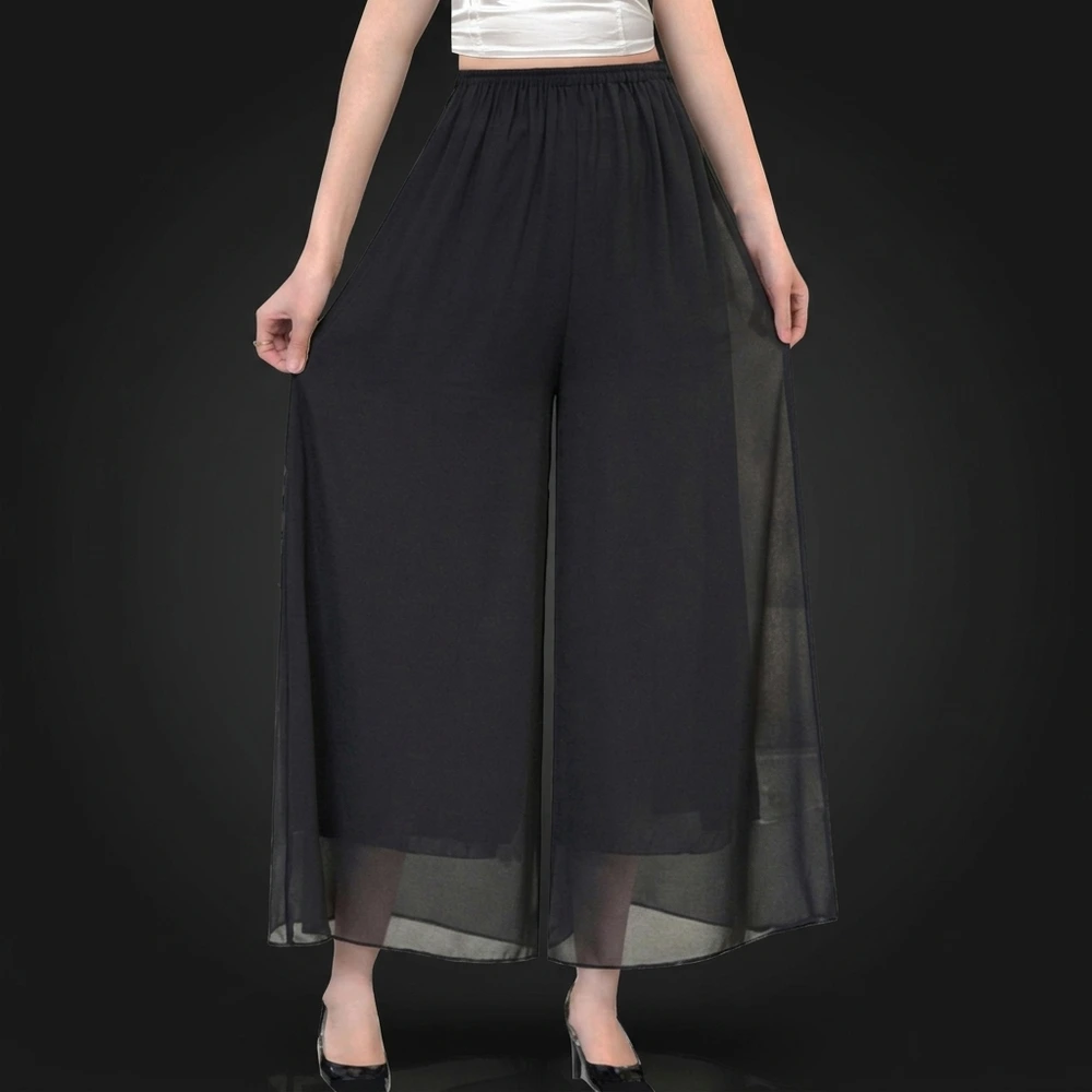 The sheer chiffon overlay of the palazzo pants held out to show the double-layer construction