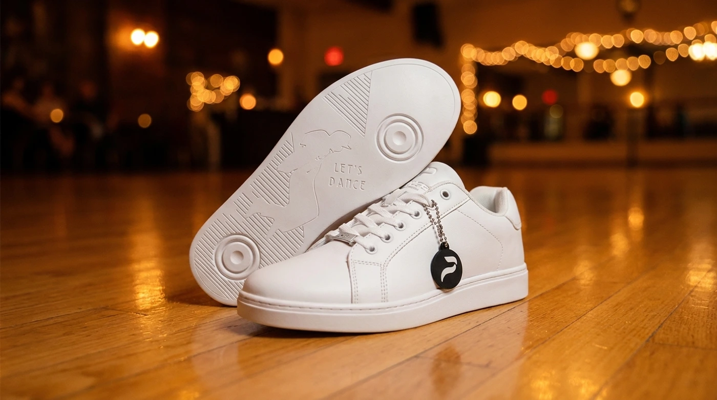 Pulse Dance Sneaker on a warm-lit wooden social dance floor